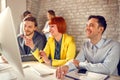 Workpeople looking on computers screen Royalty Free Stock Photo